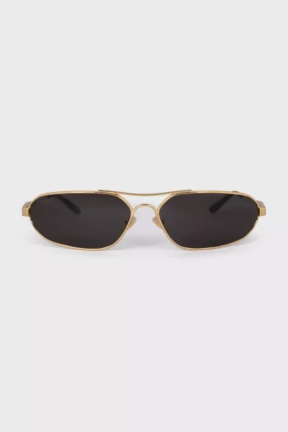 Men's gold sunglasses with tag