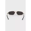 Men's gold sunglasses with tag