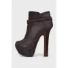 Brown leather ankle boots with buckle