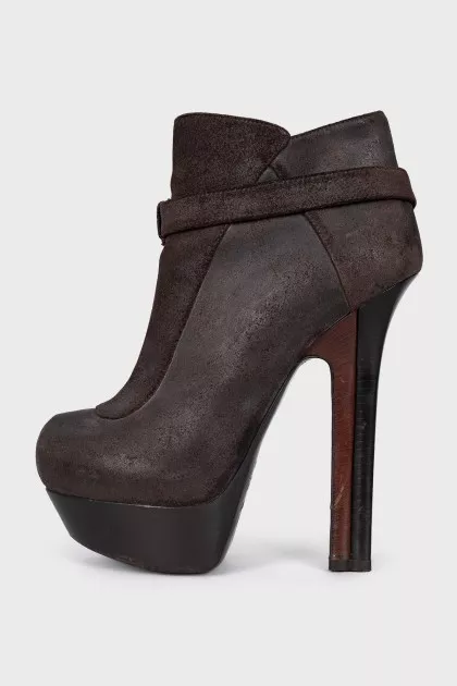 Brown leather ankle boots with buckle