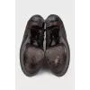 Brown leather ankle boots with buckle