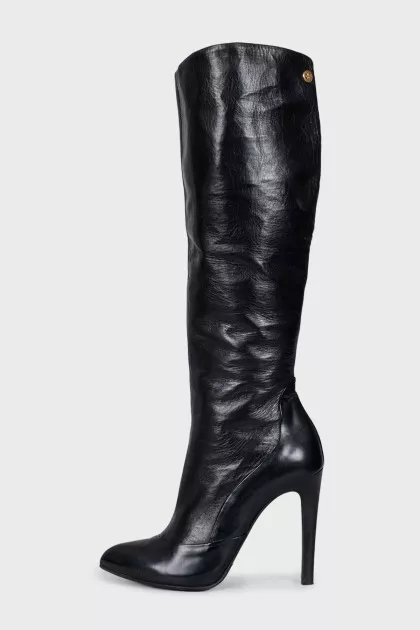 Black leather boots with pointed toes
