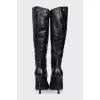 Black leather boots with pointed toes