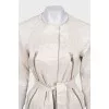 Coat with buttons and belt