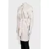 Coat with buttons and belt