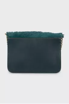 Crossbody bag decorated with fur