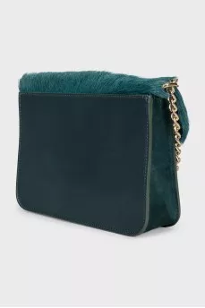Crossbody bag decorated with fur
