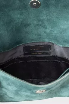 Crossbody bag decorated with fur