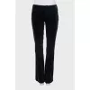 Black velvet flared trousers