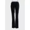 Black velvet flared trousers