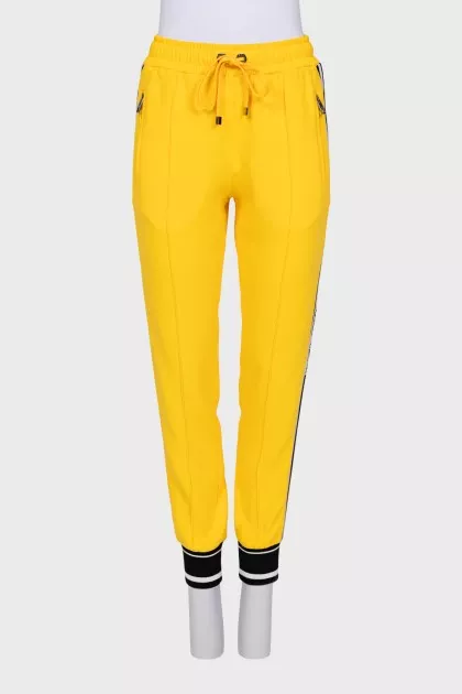 Sports yellow trousers with stripes