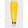 Sports yellow trousers with stripes