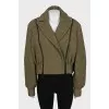 Cropped green jacket with detachable sleeves