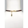 Necklace with metal feathers and eagle heads