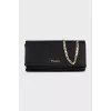 Clutch on a gold chain
