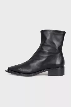 Black leather pointed toe boots