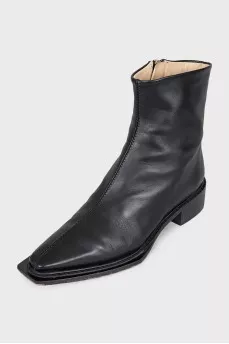 Black leather pointed toe boots