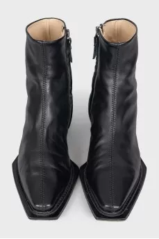 Black leather pointed toe boots
