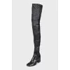 Black leather over-the-knee boots with heels