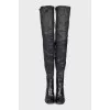 Black leather over-the-knee boots with heels