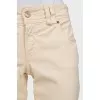 Beige flared jeans