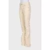 Beige flared jeans