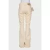 Beige flared jeans