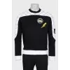 Men's black and white sweatshirt with a patch