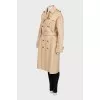 Beige trench coat with belt