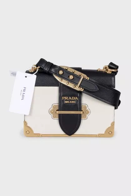 Leather and metal crossbody bag with tag