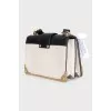 Leather and metal crossbody bag with tag