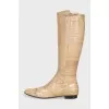 Yellow boots with embossed stripes