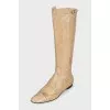 Yellow boots with embossed stripes
