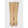 Yellow boots with embossed stripes