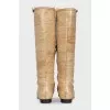 Yellow boots with embossed stripes