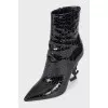 Leather ankle boots with a signature heel