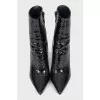 Leather ankle boots with a signature heel