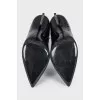 Leather ankle boots with a signature heel
