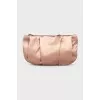 Textile clutch with a flower