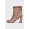 Brown leather ankle boots with chain