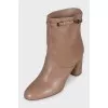 Brown leather ankle boots with chain