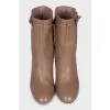 Brown leather ankle boots with chain