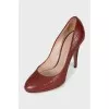 Leather shoes with embossed heels