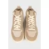 High-top beige suede sneakers