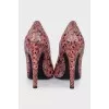Pink snakeskin shoes