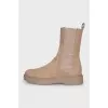 Beige suede boots