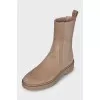 Beige suede boots