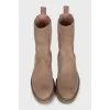 Beige suede boots