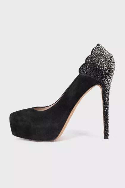 Black suede shoes decorated with rhinestones