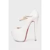 White snakeskin shoes
